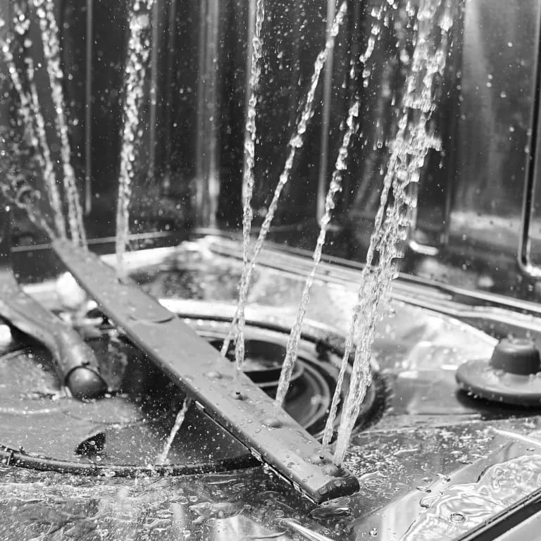 spray arm spraying water